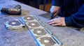 ÃÂ¡raftsman disassembles aluminum blanks of metal profile. Steel industry. Cutting aluminium billet